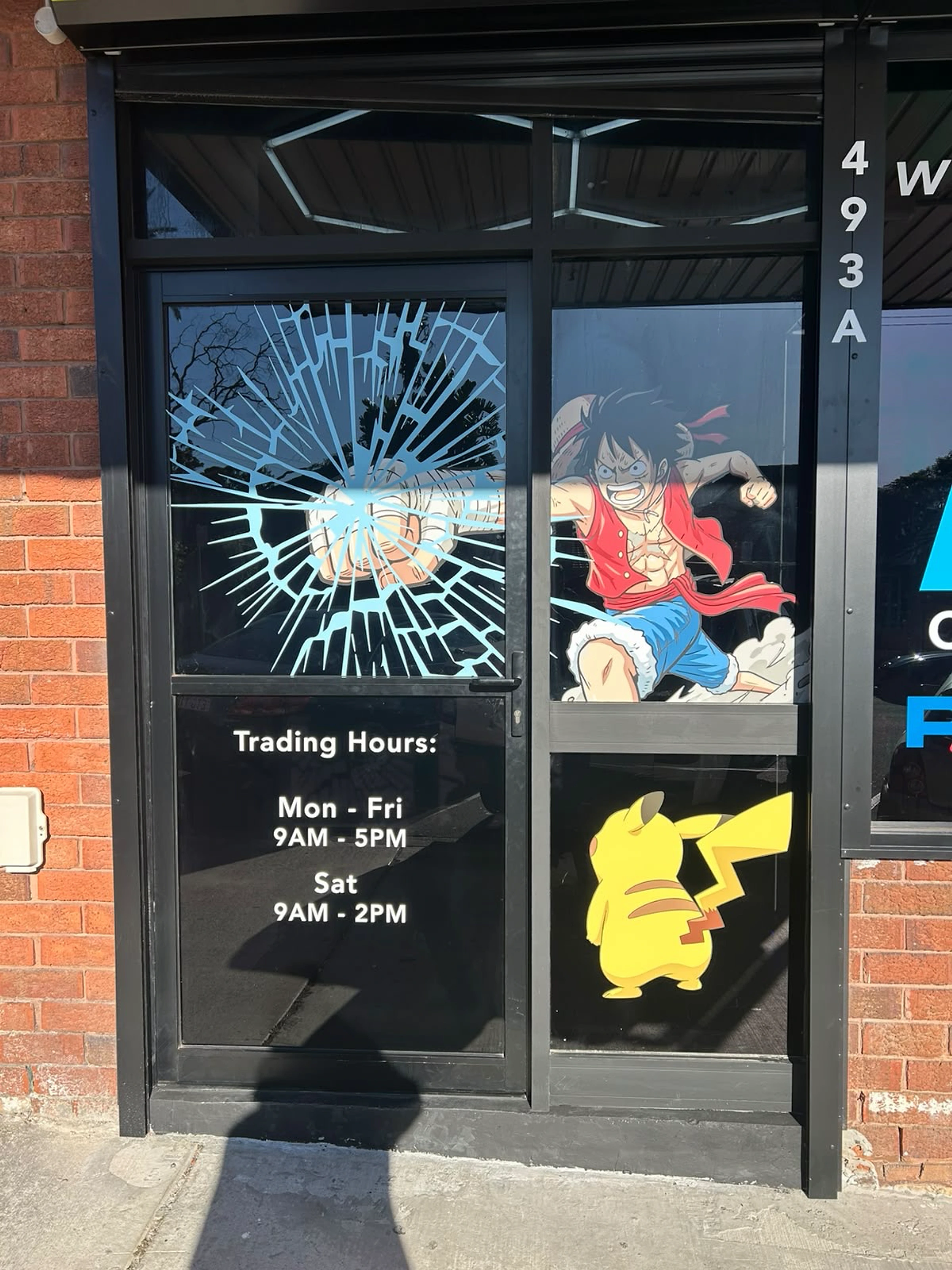 CardRevive entrance marked 493A with opening hours: Monday to Friday 9am to 5pm and Saturday 9am to 2pm.