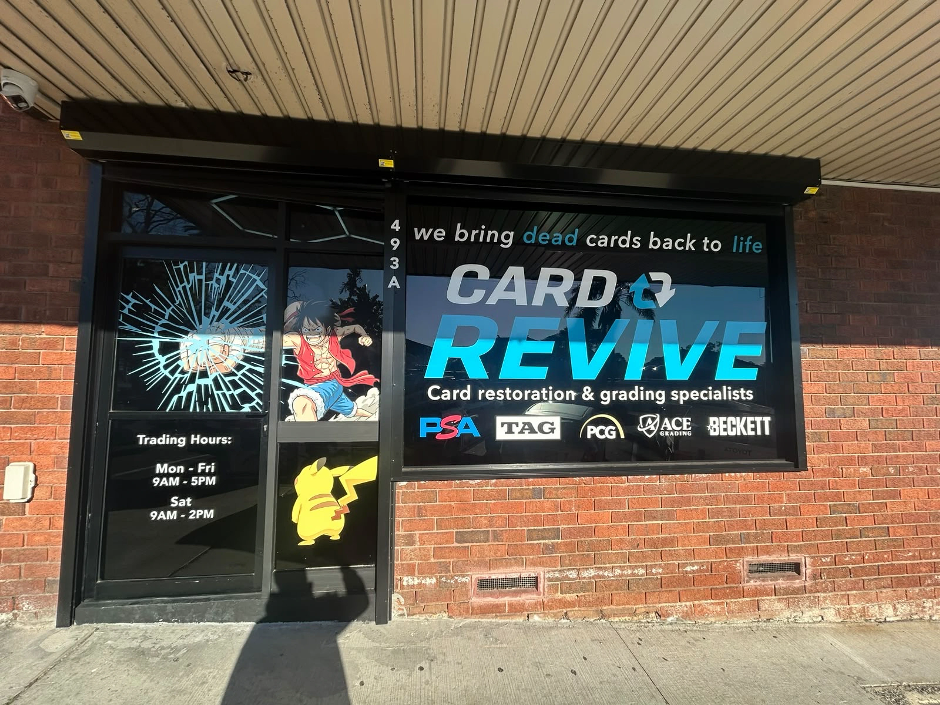 Full street-facing view of the CardRevive storefront and entrance at 493a Forest Road, Penshurst.